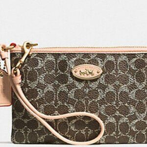Coach Corner Zip Wristlet in Embossed Signature F53009
